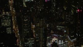 5K aerial stock footage of tracking the One57 skyscraper in Midtown Manhattan, New York City, winter, night Aerial Stock Footage | AX0065_0343