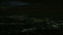 7.6K aerial stock footage passing suburban neighborhoods at night in Burbank, California Aerial Stock Footage | AX0156_002