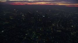 7.6K aerial stock footage flying over Downtown Los Angeles skyscrapers at sunrise, California Aerial Stock Footage | AX0156_034E