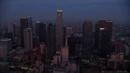 7.6K aerial stock footage passing by giant skyscrapers in Downtown Los Angeles at sunrise, California Aerial Stock Footage | AX0156_060E