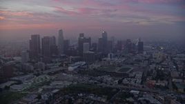 7.6K aerial stock footage of a reverse view of Downtown Los Angeles, California on a hazy morning Aerial Stock Footage | AX0156_070