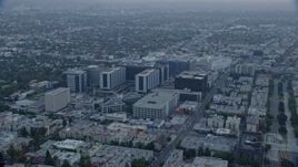 7.6K aerial stock footage orbiting Cedars-Sinai Medical Center at sunrise in Beverly Hills, California Aerial Stock Footage | AX0156_125E