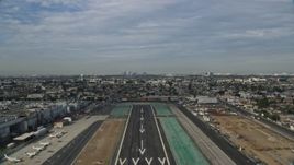 7.6K aerial stock footage taking off from Hawthorne Airport and fly over residential area, Hawthorne, California Aerial Stock Footage | AX0157_001