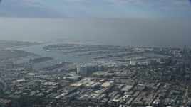 7.6K aerial stock footage of harbors and industrial area on cloudy day, Marina Del Rey, California Aerial Stock Footage | AX0157_010