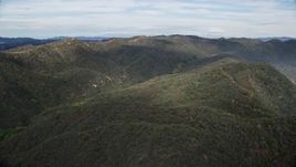 7.6K aerial stock footage of rolling green Santa Monica Mountains, California Aerial Stock Footage | AX0157_016E