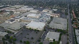 7.6K aerial stock footage orbiting Macy's and Northridge Shopping Mall in Northridge, California Aerial Stock Footage | AX0157_059E