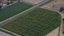 7.6K aerial stock footage of Forneris Farms corn maze in Mission Hills, California Aerial Stock Footage | AX0157_081