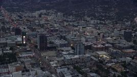7.6K aerial stock footage businesses along Sunset Boulevard at twilight, Hollywood, California Aerial Stock Footage | AX0158_016