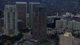 7.6K aerial stock footage orbiting Fox Tower at twilight, Century City, California Aerial Stock Footage | AX0158_027