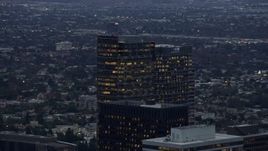 7.6K aerial stock footage orbiting office and apartment buildings, twilight, Century City, California Aerial Stock Footage | AX0158_031E