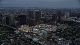 7.6K aerial stock footage orbiting Westfield shopping mall and bordering office buildings, twilight, Century City, California Aerial Stock Footage | AX0158_033