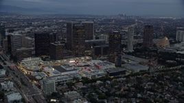 7.6K aerial stock footage orbiting office buildings and skyscrapers at twilight, Century City, California Aerial Stock Footage | AX0158_034E