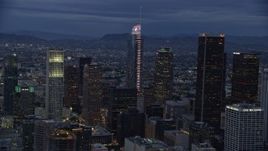 7.6K aerial stock footage of Wilshire Grand Center and nearby skyscrapers at twilight in Downtown Los Angeles, California Aerial Stock Footage | AX0158_047E