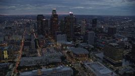 7.6K aerial stock footage of tall skyscrapers at twilight in Downtown Los Angeles, California Aerial Stock Footage | AX0158_050E