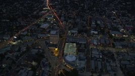 7.6K aerial stock footage approaching and tilt to the Angelus Temple and parking garage at twilight in Echo Park, Los Angeles, California Aerial Stock Footage | AX0158_054
