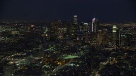 7.6K aerial stock footage of tall downtown skyscrapers at nighttime, Downtown Los Angeles, California Aerial Stock Footage | AX0158_085E