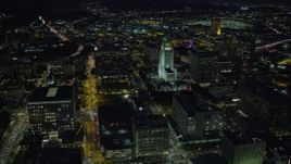 7.6K aerial stock footage orbiting LA City Hall to reveal skyscrapers at night in Downtown Los Angeles, California Aerial Stock Footage | AX0158_106E