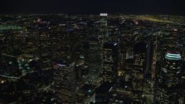 7.6K aerial stock footage flying by skyscrapers at night, and approach US Bank Tower, Downtown Los Angeles, California Aerial Stock Footage | AX0158_120