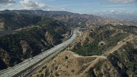 7.6K aerial stock footage flying over I-5 with light traffic, Santa Clarita, California Aerial Stock Footage | AX0159_010E