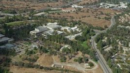 7.6K aerial stock footage orbiting the campus of California Institute of the Arts, Santa Clarita, California Aerial Stock Footage | AX0159_017E