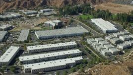 7.6K aerial stock footage orbiting tech office buildings, Valencia, California Aerial Stock Footage | AX0159_037
