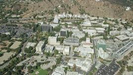 7.6K aerial stock footage of reverse orbit of the Jet Propulsion Laboratory campus, Pasadena, California Aerial Stock Footage | AX0159_070