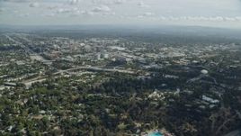 7.6K aerial stock footage flying over office buildings and retail areas in Old Pasadena, California Aerial Stock Footage | AX0159_093E