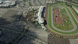 7.6K aerial stock footage orbiting the Santa Anita Park horse racing track in Arcadia, California Aerial Stock Footage | AX0159_115E