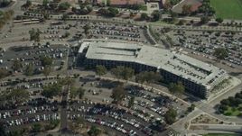 7.6K aerial stock footage approaching the Cal Poly parking garage in Pomona, California Aerial Stock Footage | AX0159_132