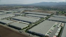 7.6K aerial stock footage of several warehouses in Chino, California Aerial Stock Footage | AX0159_151E