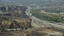 7.6K aerial stock footage of Highway 91 at Highway 241, Anaheim, California Aerial Stock Footage | AX0159_157
