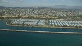7.6K aerial stock footage of Dana Point Harbor and oceanfront neighborhoods in Dana Point, California Aerial Stock Footage | AX0159_190