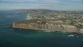 7.6K aerial stock footage approaching mansions on cliffs overlooking the ocean in Dana Point, California Aerial Stock Footage | AX0159_191
