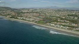 7.6K aerial stock footage of beachfront mansions by Dana Strands Beach in Dana Point, California Aerial Stock Footage | AX0159_200