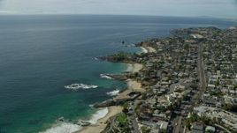 7.6K aerial stock footage flying over coves and bay near coastal highway, Laguna Beach, California Aerial Stock Footage | AX0159_211
