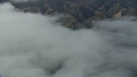 7.6K aerial stock footage of low clouds over Avalon, Catalina Island, California Aerial Stock Footage | AX0159_249