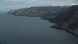 7.6K aerial stock footage of steep cliffs and coastline of Santa Catalina Island, California Aerial Stock Footage | AX0160_020