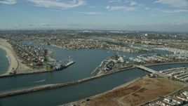 7.6K aerial stock footage of coastal neighborhoods around an inlet and Alamitos Bay in Long Beach, California Aerial Stock Footage | AX0160_055E