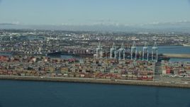 7.6K aerial stock footage of shipping containers and cargo cranes at the Port of Los Angeles, California Aerial Stock Footage | AX0161_012