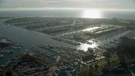 7.6K aerial stock footage of boats at the marinas and waterfront apartment buildings in Marina Del Rey, California Aerial Stock Footage | AX0161_056E