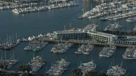 7.6K aerial stock footage of Marina Del Rey Hotel and boats in the marina in Marina Del Rey, California Aerial Stock Footage | AX0161_058