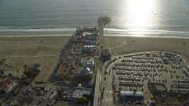7.6K aerial stock footage flying over Santa Monica Pier in Santa Monica, California Aerial Stock Footage | AX0161_076E