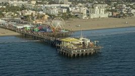 7.6K aerial stock footage of tourists at Santa Monica Pier in Santa Monica, California Aerial Stock Footage | AX0161_080E