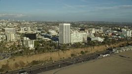 7.6K aerial stock footage of office Buildings beside the Pacific Coast Highway in Santa Monica, California Aerial Stock Footage | AX0161_082