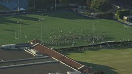 7.6K aerial stock footage of the College band practice on Intramural Field in Los Angeles, California Aerial Stock Footage | AX0161_092