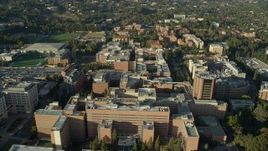 7.6K aerial stock footage orbiting College university campus buildings in Los Angeles, California Aerial Stock Footage | AX0161_093E