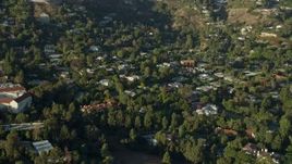 7.6K aerial stock footage of mansions in Beverly Glen, Los Angeles, California Aerial Stock Footage | AX0161_098