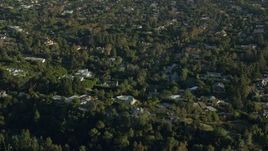 7.6K aerial stock footage flying by mansions in upscale neighborhoods in Beverly Hills, California Aerial Stock Footage | AX0161_104