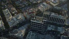 7.6K aerial stock footage flying over and circling office buildings and shops in Beverly Hills, California Aerial Stock Footage | AX0161_114E