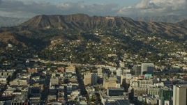 7.6K aerial stock footage of the Hollywood Sign, hillside homes, and office buildings in Hollywood, California Aerial Stock Footage | AX0161_121